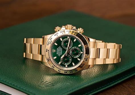 Rolex gold watch green face